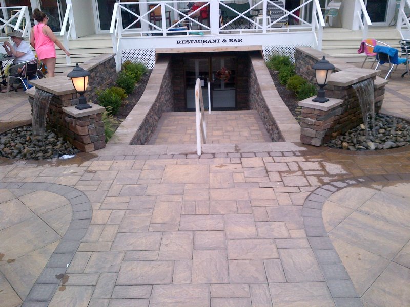 paver patio with sheer descent waterfall