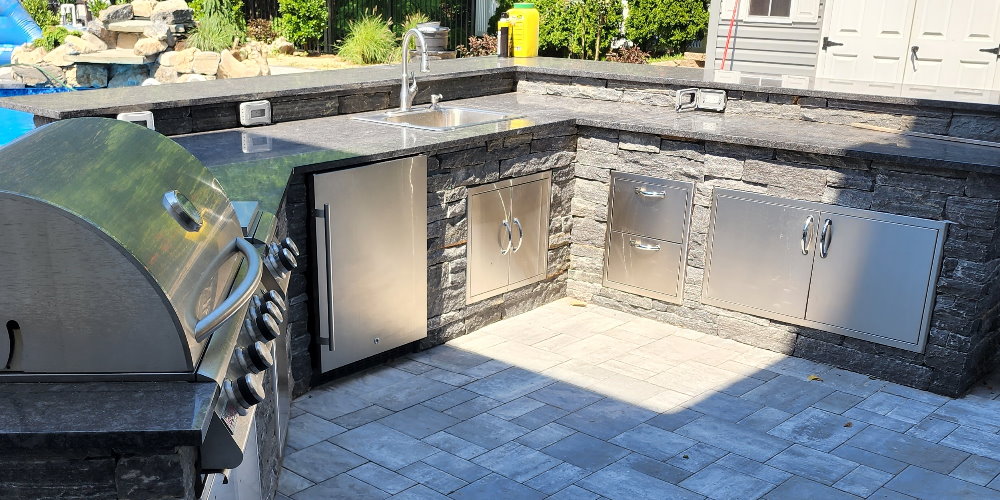 outdoor kitchen with granite counter tops