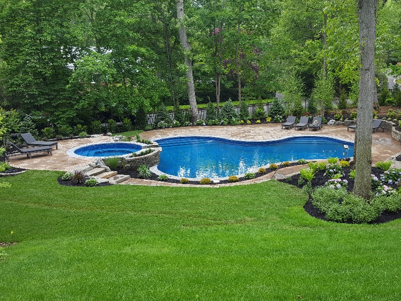 pool paver patio with hot tub